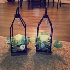 Two Black Kirkland’s battery powered lanterns